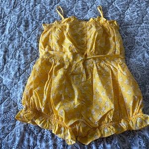 Brand new adorable romper, never worn.